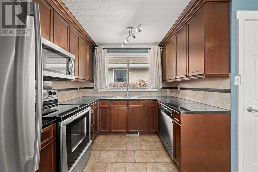 316 56 Avenue Ne, Calgary, Alberta  T2K 0L2 - Photo 8 - A2221727