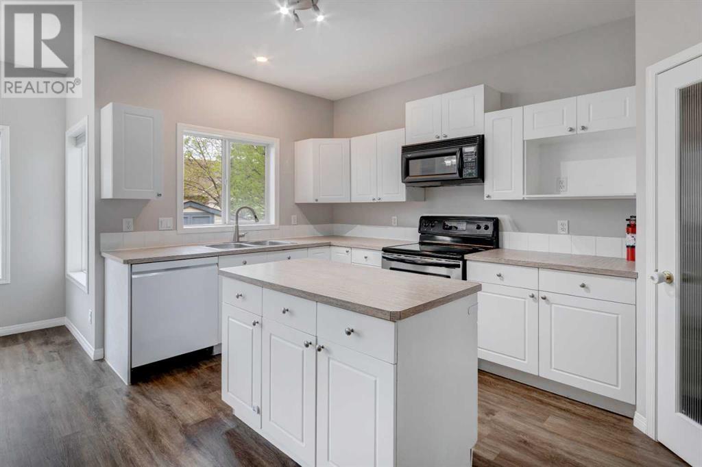 1 Bow Ridge Crescent, Cochrane, Alberta  T4C 1T5 - Photo 10 - A2219444