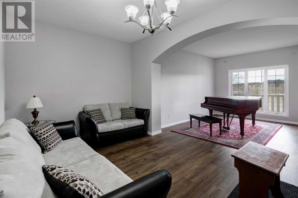 1 Bow Ridge Crescent, Cochrane, Alberta  T4C 1T5 - Photo 7 - A2219444
