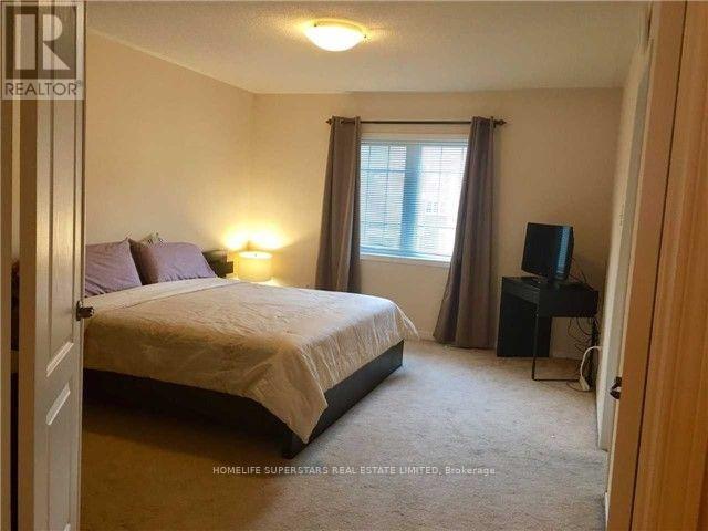 203 - 7360 Zinnia Place, Mississauga, Ontario  L5W 2A3 - Photo 7 - W12184164