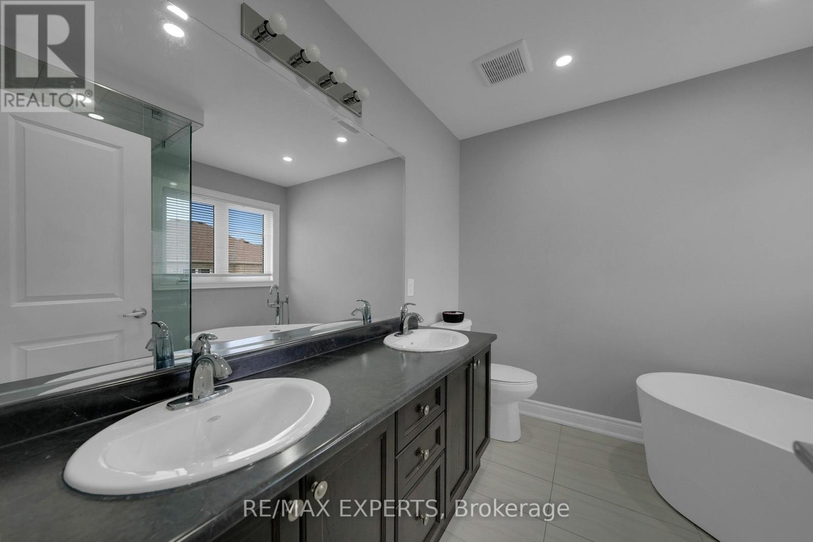 86 Holt Drive, New Tecumseth, Ontario  L9R 0R2 - Photo 25 - N12189347
