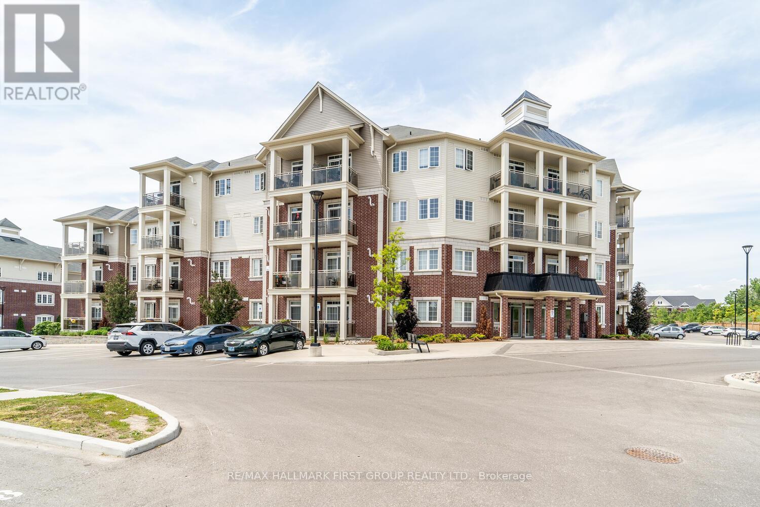 119 - 80 Aspen Springs Drive, Clarington, Ontario  L1C 4Y2 - Photo 1 - E12189432