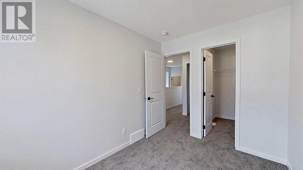 98 Edith Green Nw, Calgary, Alberta  T3R 2B5 - Photo 24 - A2221247