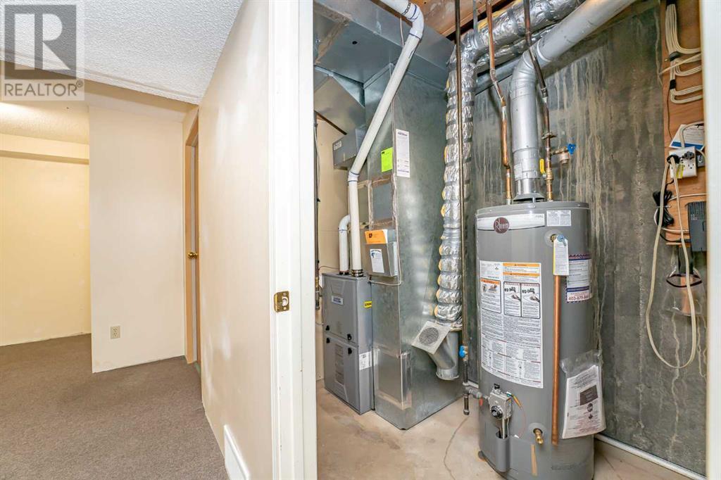 215 Coachway Lane Sw, Calgary, Alberta  T3H 2V9 - Photo 40 - A2221676