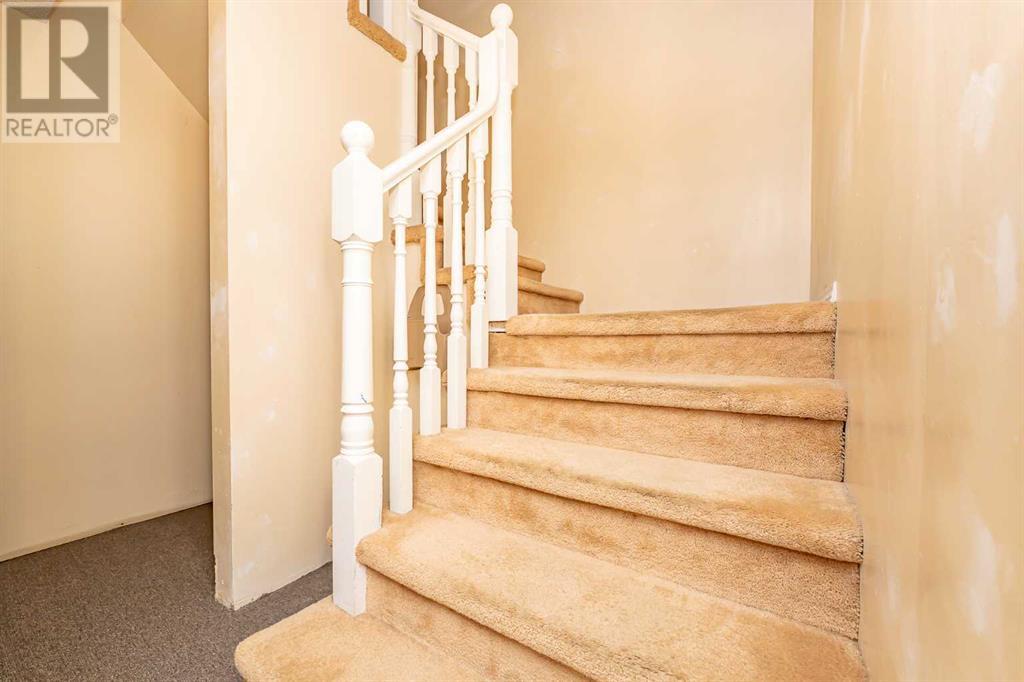 215 Coachway Lane Sw, Calgary, Alberta  T3H 2V9 - Photo 38 - A2221676