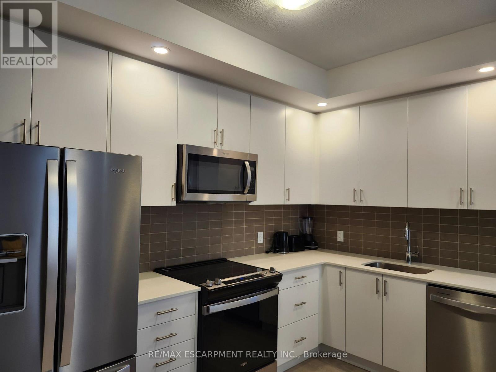 607 - 3220 William Coltson Avenue, Oakville, Ontario  L6H 7X9 - Photo 5 - W12189992