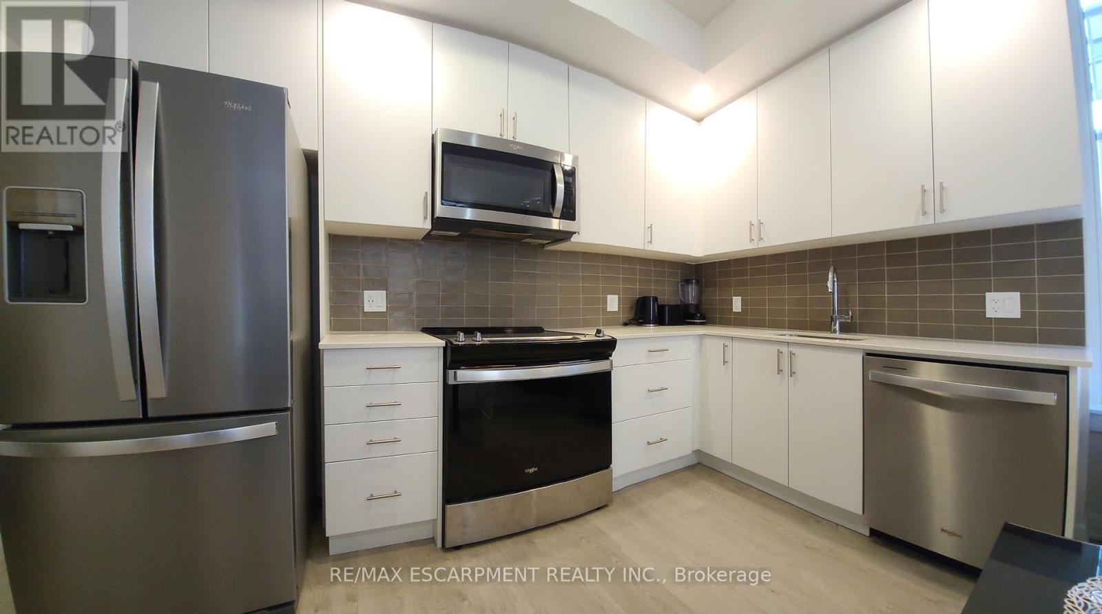 607 - 3220 William Coltson Avenue, Oakville, Ontario  L6H 7X9 - Photo 6 - W12189992