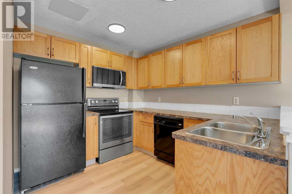 169 Bayside Point Sw, Airdrie, Alberta  T4B 2Z2 - Photo 7 - A2225640