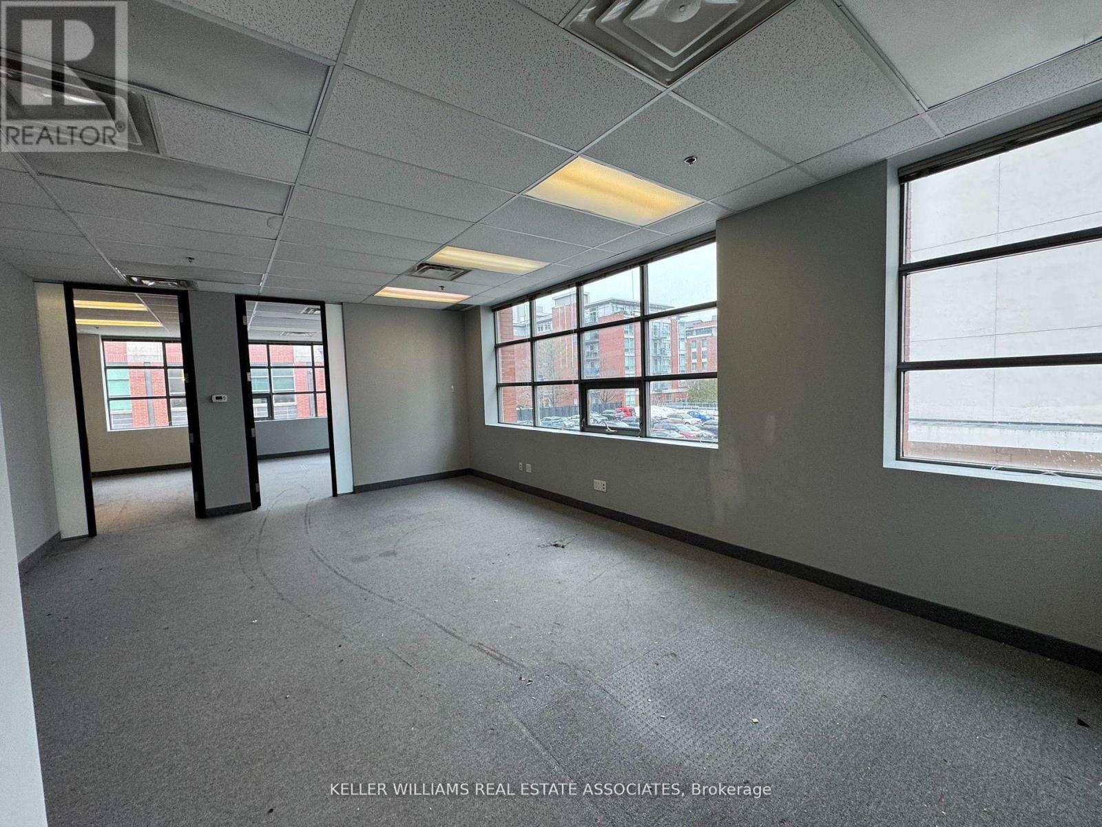 203 - 125 Lakeshore Road E, Mississauga, Ontario  L5G 1E5 - Photo 1 - W12045516