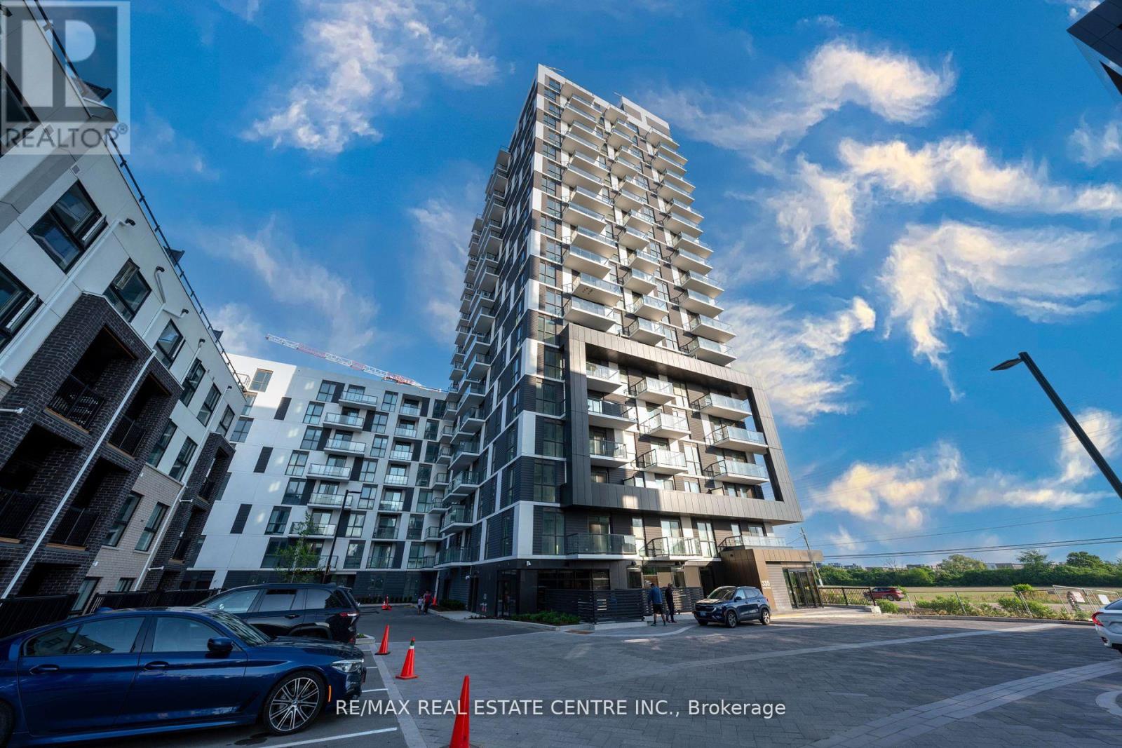 909 - 335 Wheat Boom Drive, Oakville, Ontario  L6H 0R3 - Photo 1 - W12190613