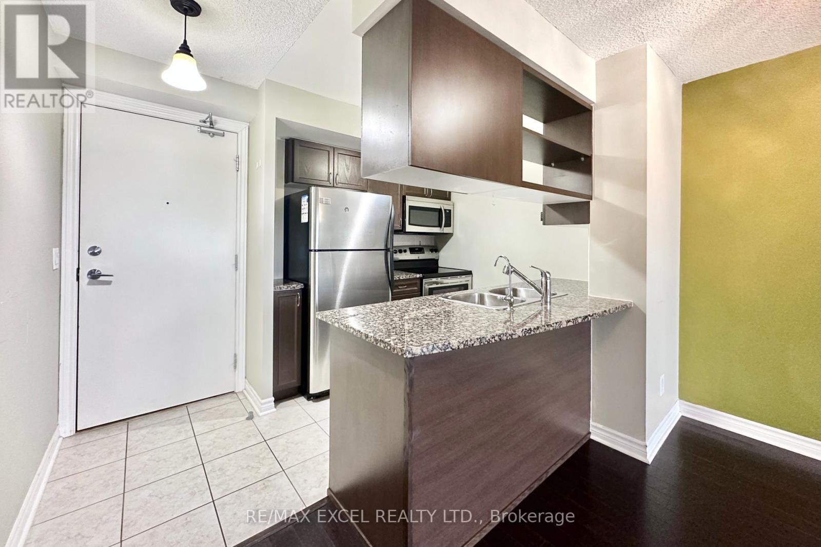 507 - 2379 Central Park Drive, Oakville (Ro River Oaks), Ontario  L6H 0E4 - Photo 5 - W12190841