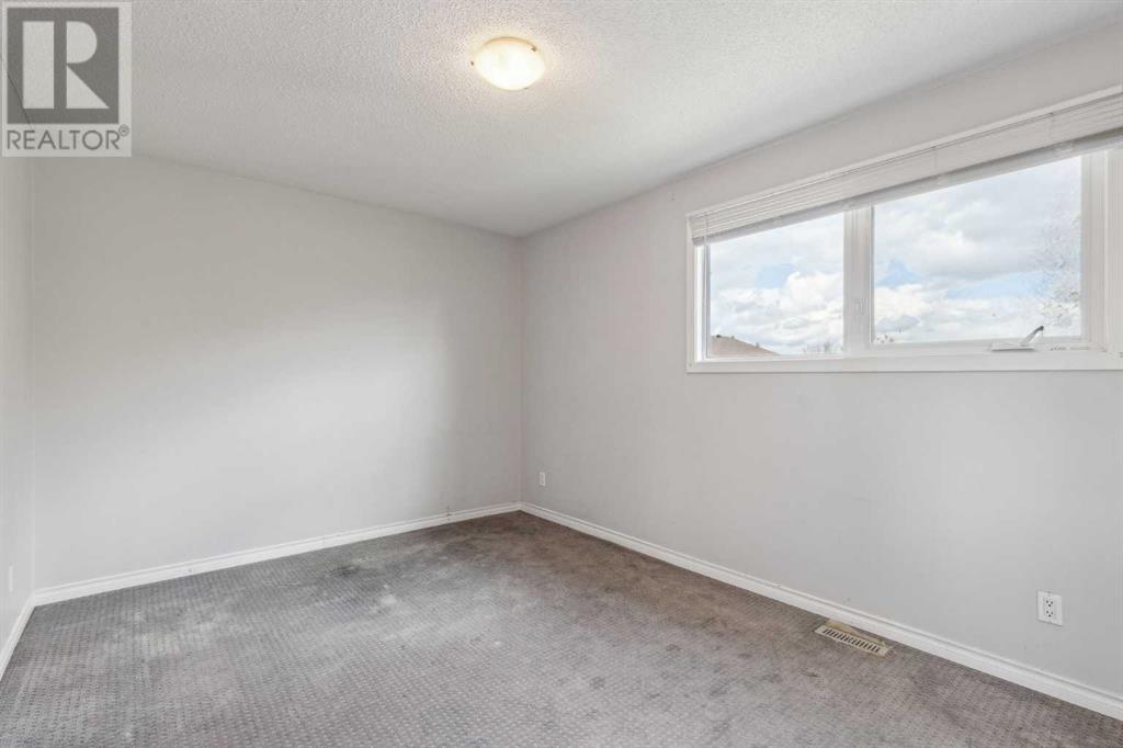 8610 Berwick Road Nw, Calgary, Alberta  T3K 1E6 - Photo 15 - A2226427