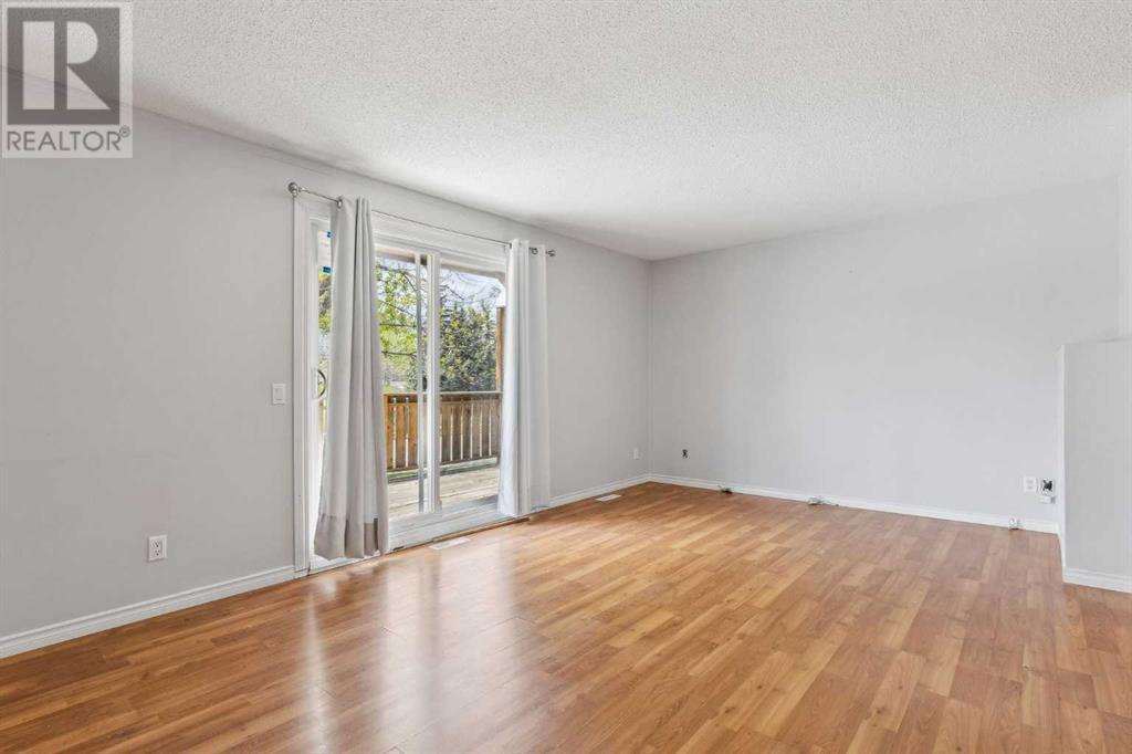8610 Berwick Road Nw, Calgary, Alberta  T3K 1E6 - Photo 4 - A2226427