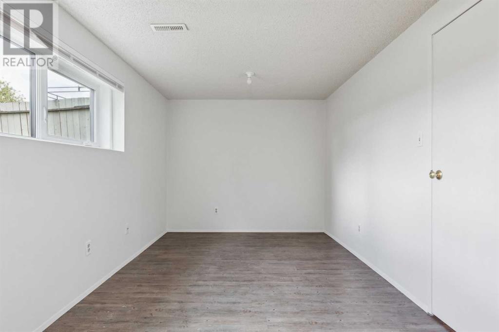 8610 Berwick Road Nw, Calgary, Alberta  T3K 1E6 - Photo 26 - A2226427