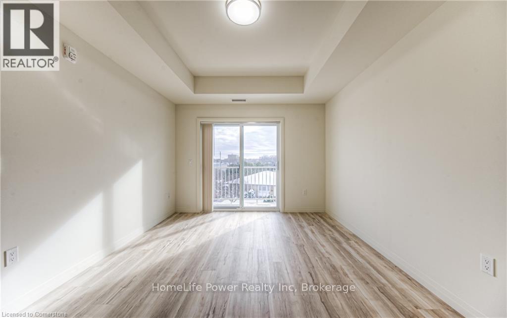 219 - 301 Westmount Road W, Kitchener, Ontario  N2M 5M9 - Photo 5 - X12191788