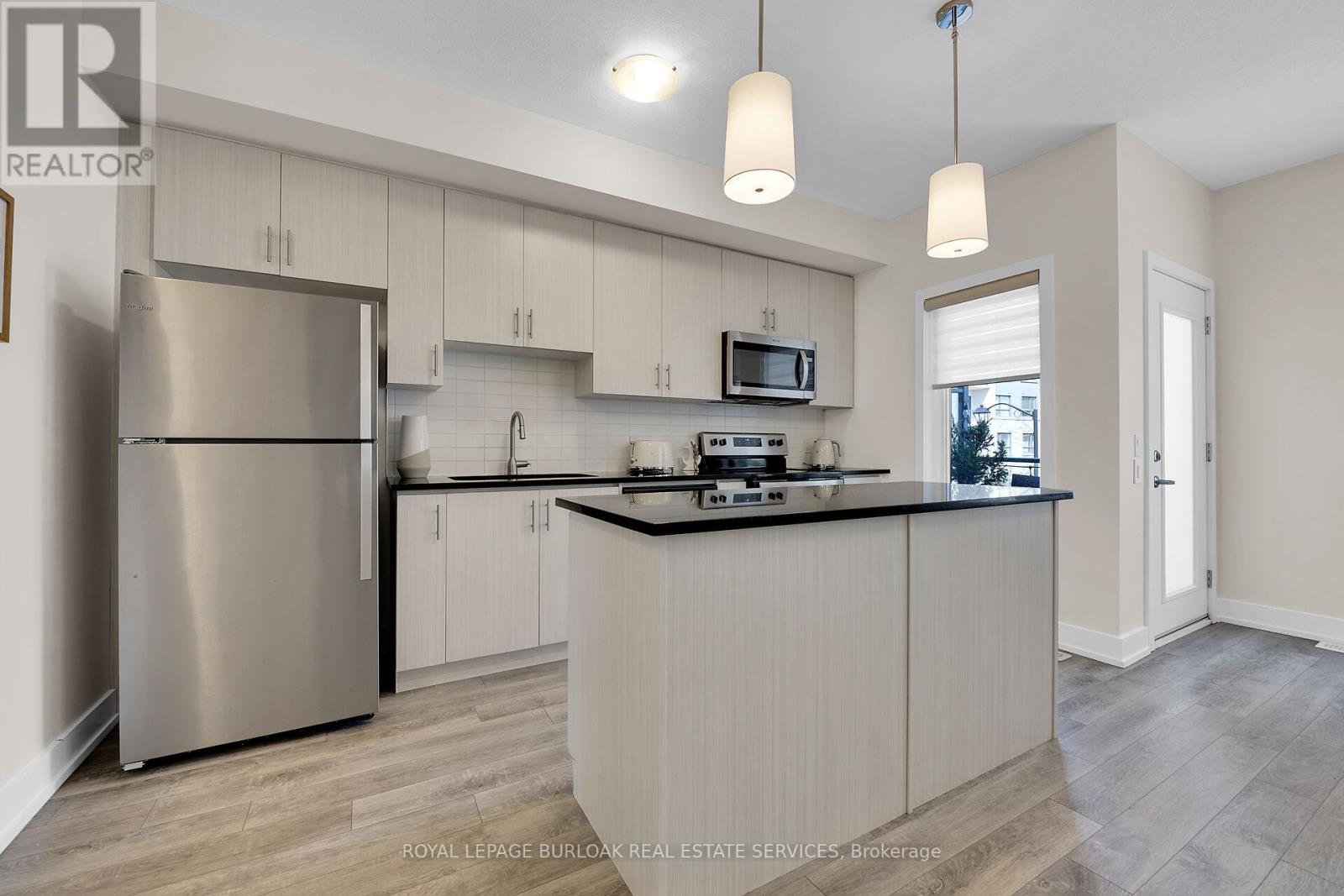 9 - 115 Shoreview Place, Hamilton (Lakeshore), Ontario  L8E 0K4 - Photo 6 - X12138485