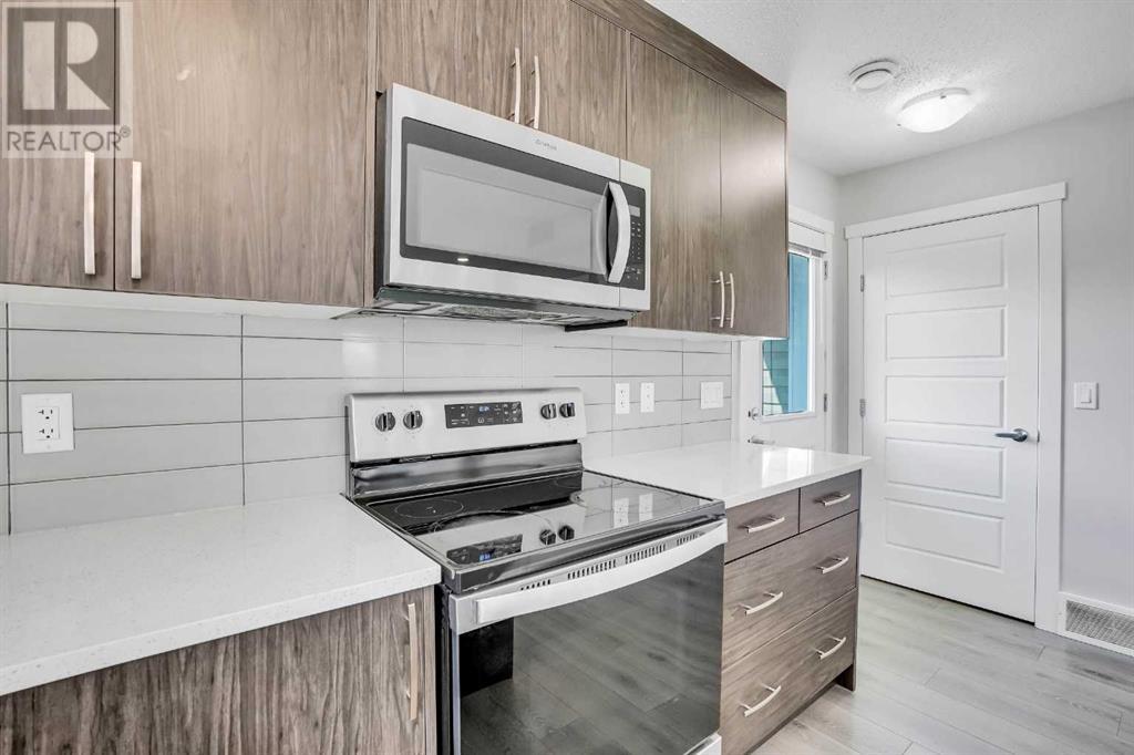 Property at 1404, 7451 Falconridge Boulevard NE image 4