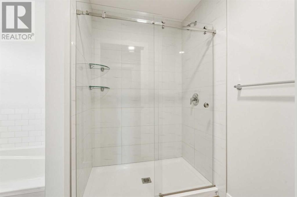 50 Creekstone Square Sw, Calgary, Alberta  T2X 4P6 - Photo 35 - A2222725