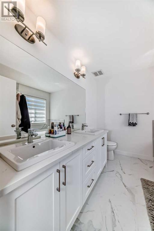 53 Spring Creek Common Sw, Calgary, Alberta  T3H 6E2 - Photo 28 - A2226779