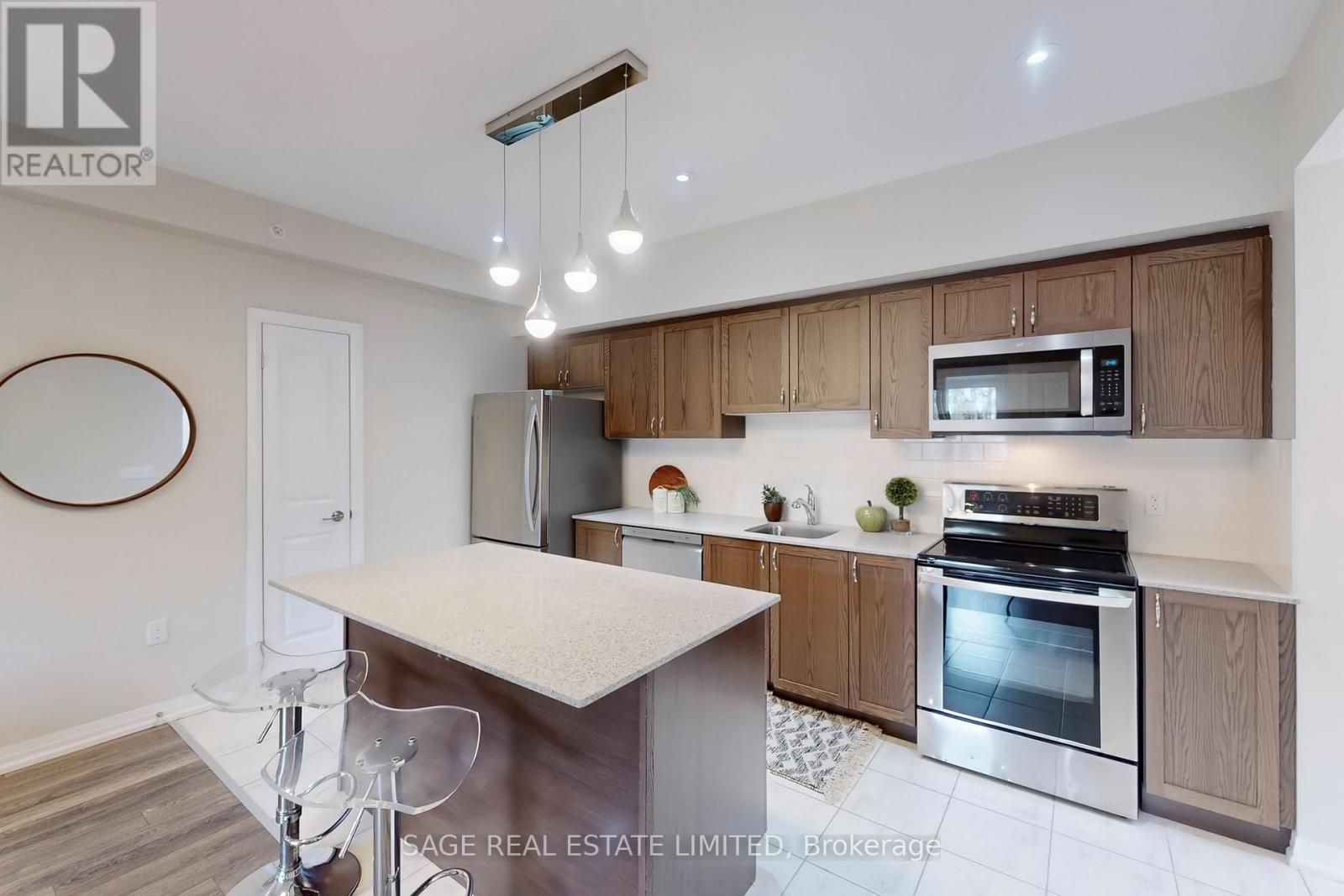 310 - 300 Essa Road, Barrie (0 West), Ontario  L9J 0B9 - Photo 4 - S12193123