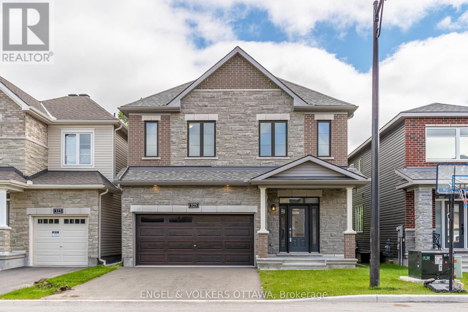 Property at 325 ELSIE MACGILL WALK image 1
