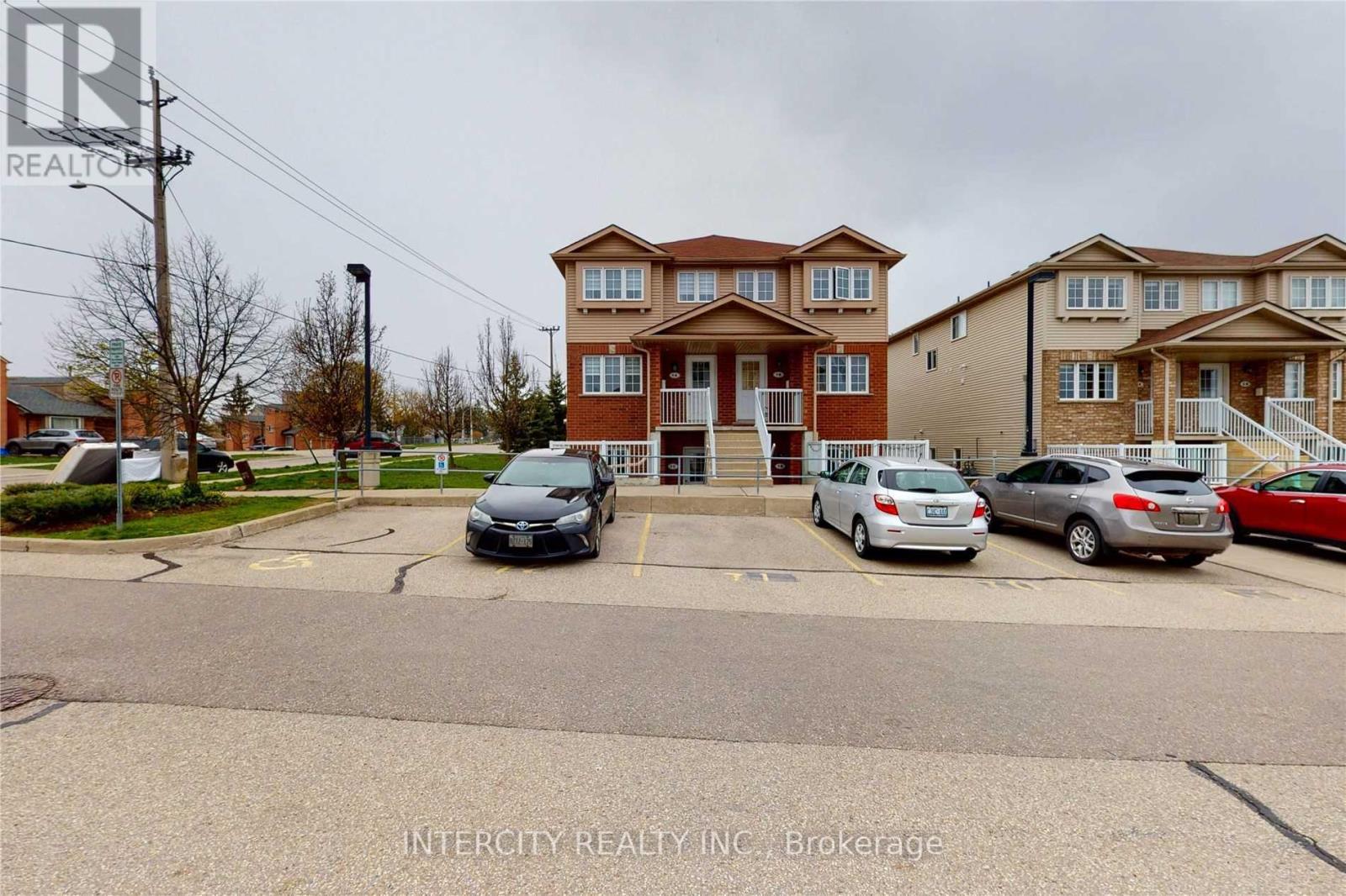 1a - 50 Howe Drive, Kitchener, Ontario  N2E 0A3 - Photo 1 - X12193776