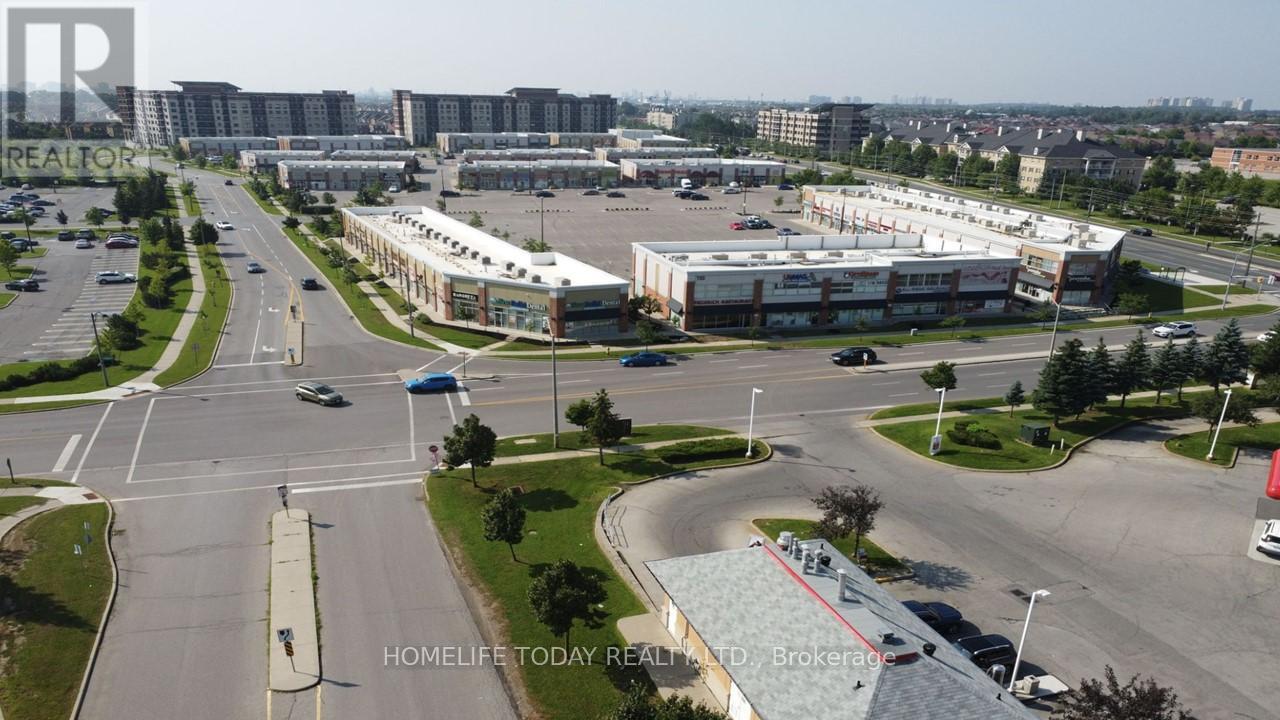 105 - 30 New Delhi Drive, Markham, Ontario  L3S 0B5 - Photo 10 - N12193795