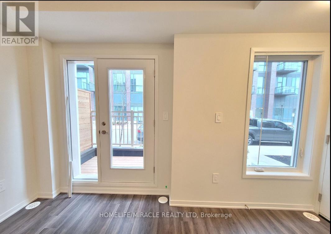 Th88 - 39 Honeycrisp Crescent, Vaughan (Vaughan Corporate Centre), Ontario  L4K 0M7 - Photo 2 - N12193816