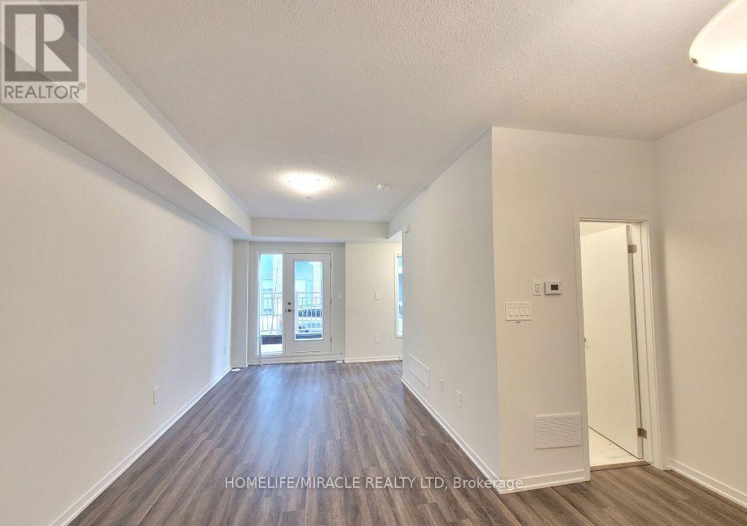 Th88 - 39 Honeycrisp Crescent, Vaughan (Vaughan Corporate Centre), Ontario  L4K 0M7 - Photo 4 - N12193816
