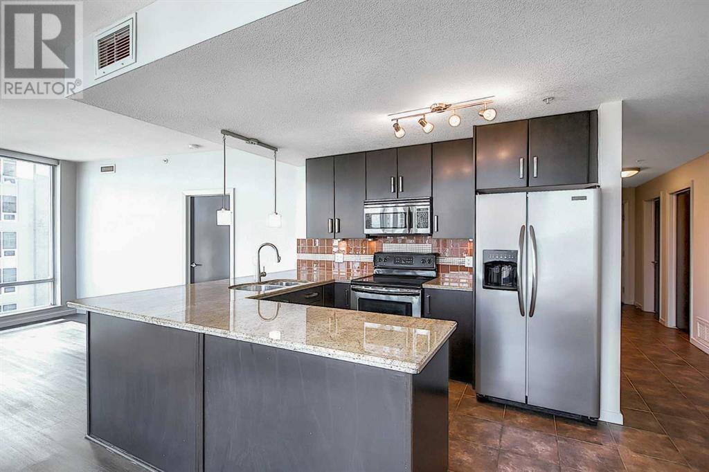 1601, 1410 1 Street Se, Calgary, Alberta  T2G 5T7 - Photo 7 - A2227018