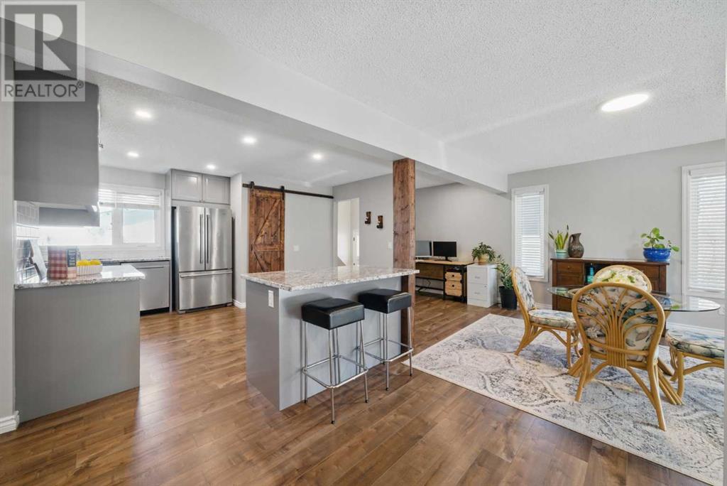 828 Hunterston Crescent Nw, Calgary, Alberta  T2K 4N2 - Photo 1 - A2215364