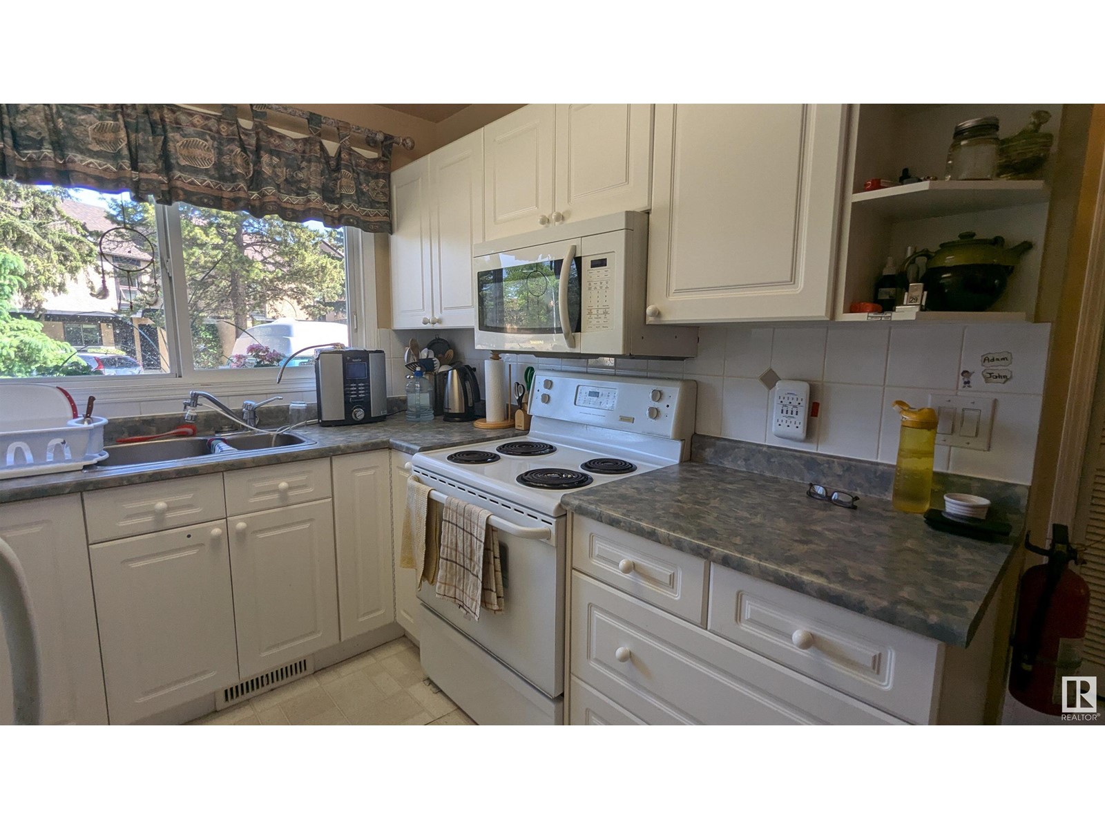 Property at 12138 25 AV NW image 3