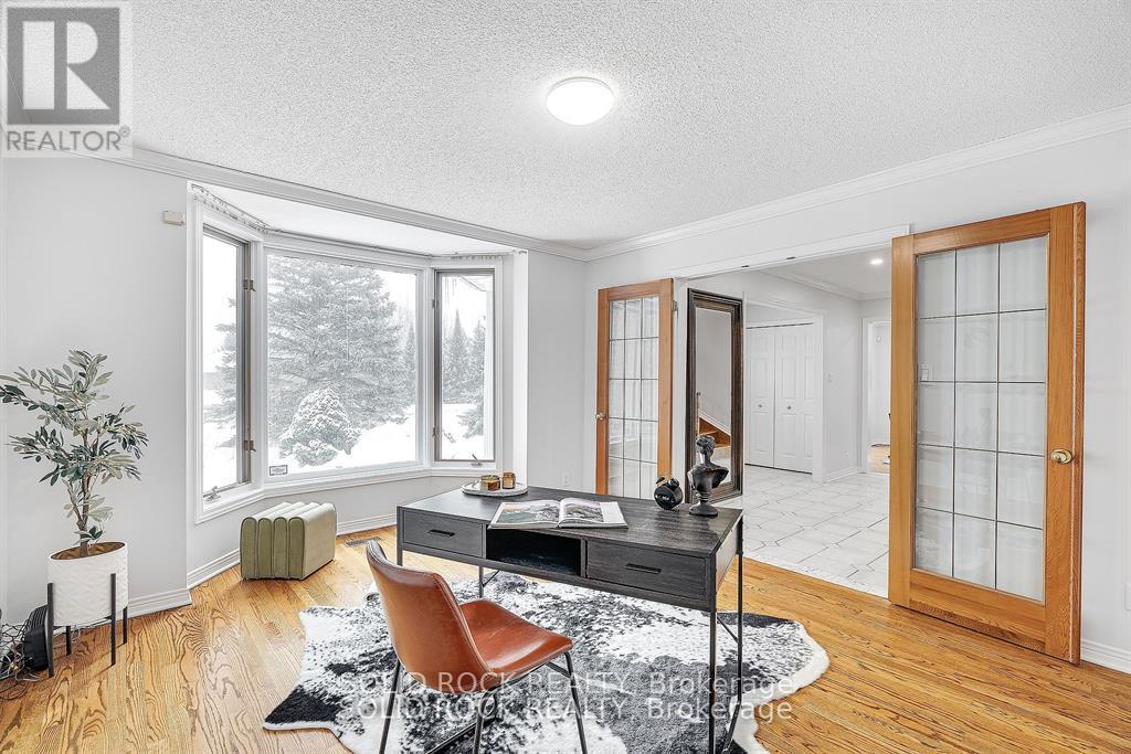 42 Marchbrook Circle, Ottawa, Ontario  K2W 1A1 - Photo 5 - X12194060