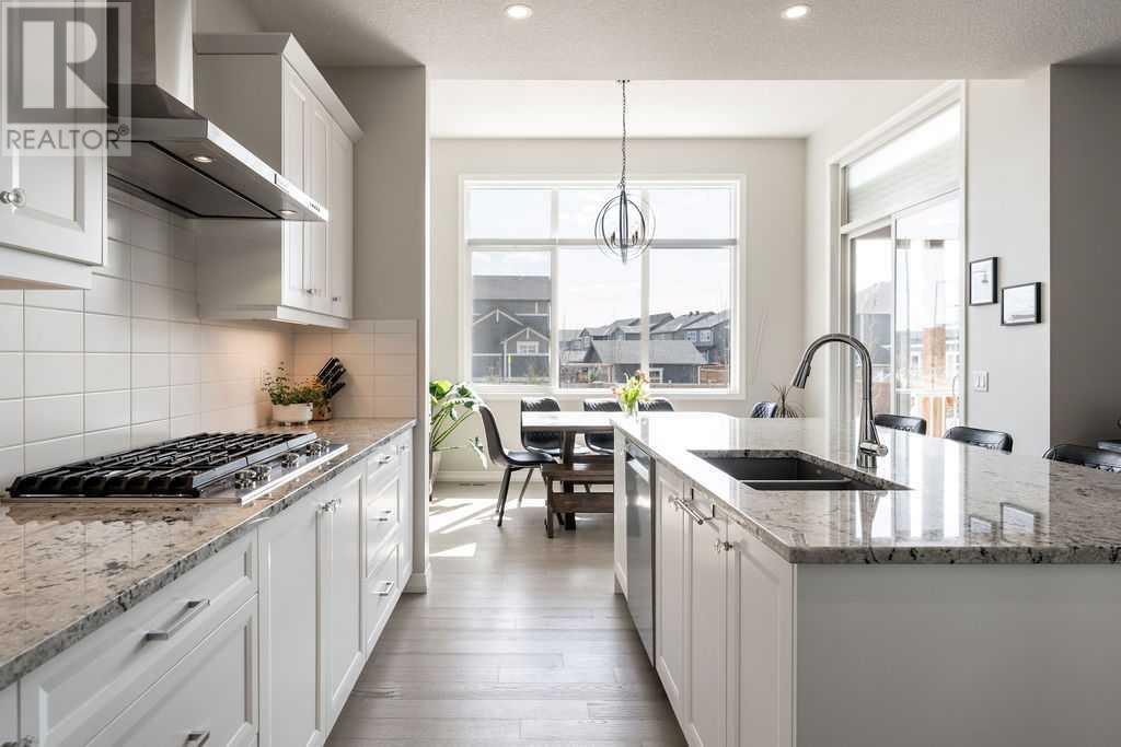 7 Sundown Crescent, Cochrane, Alberta  T4C 2T2 - Photo 6 - A2225202