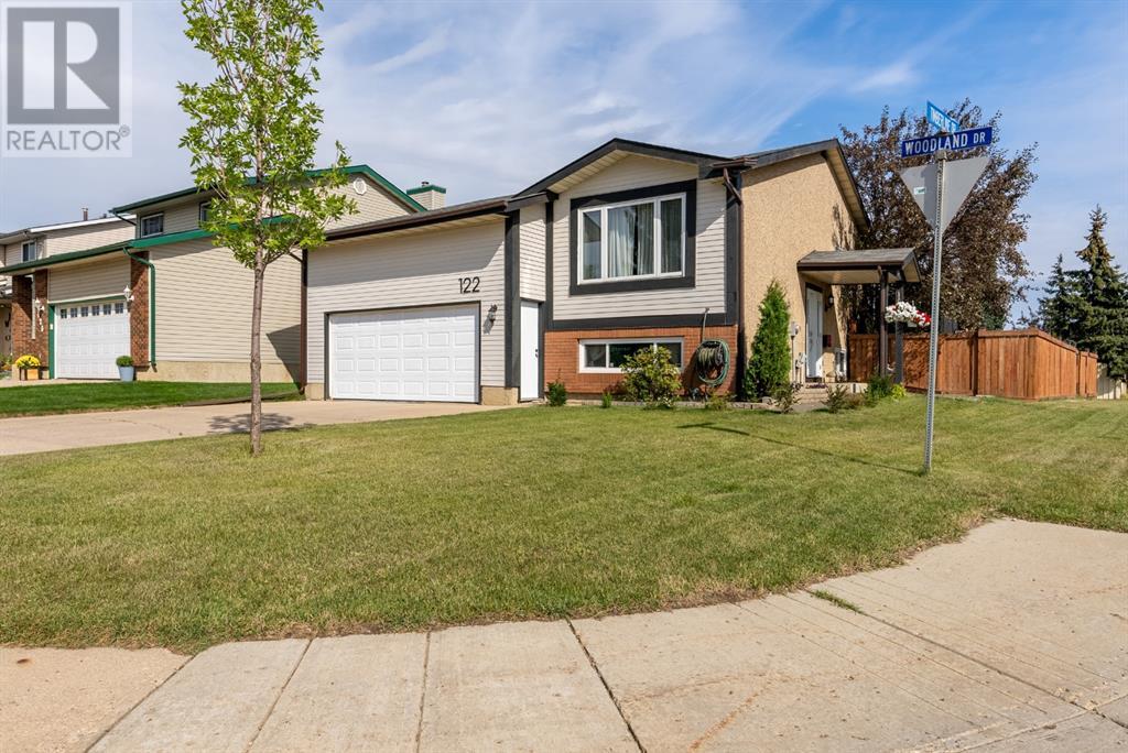 Property at 122 Woodland Drive image 1