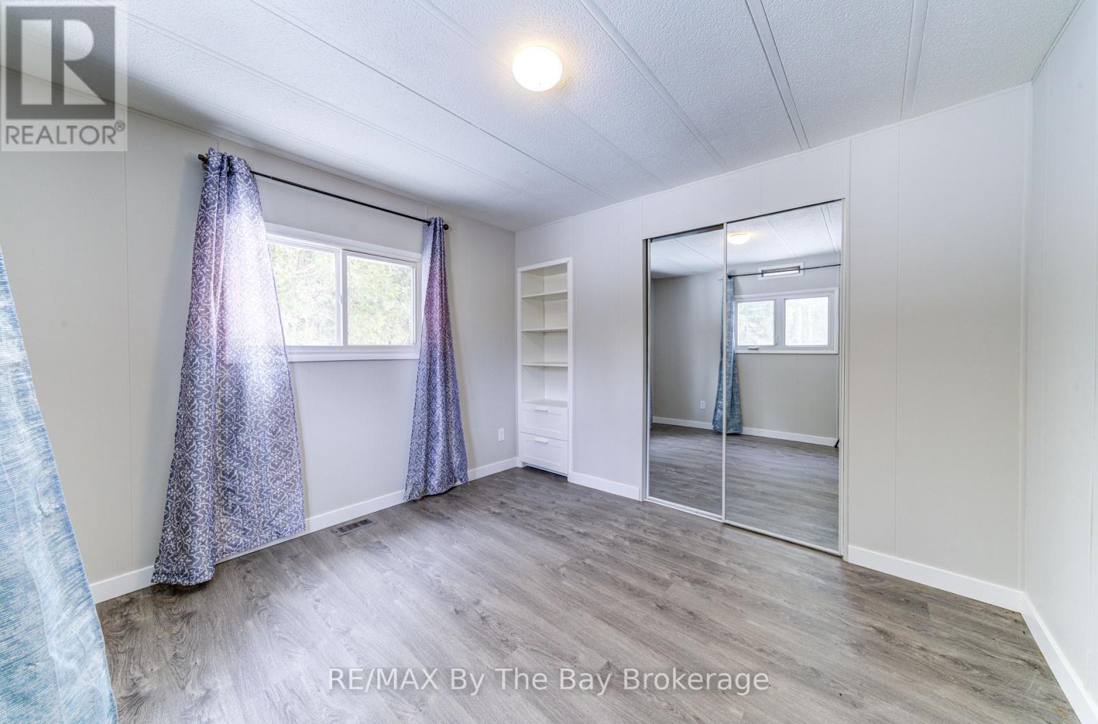 50 Georgian Glen Drive, Wasaga Beach, Ontario L9Z 1K7 - Photo 8 - S12010959