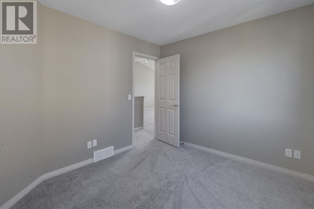 2091 Luxstone Boulevard Sw, Airdrie, Alberta  T4B 0H4 - Photo 24 - A2225023