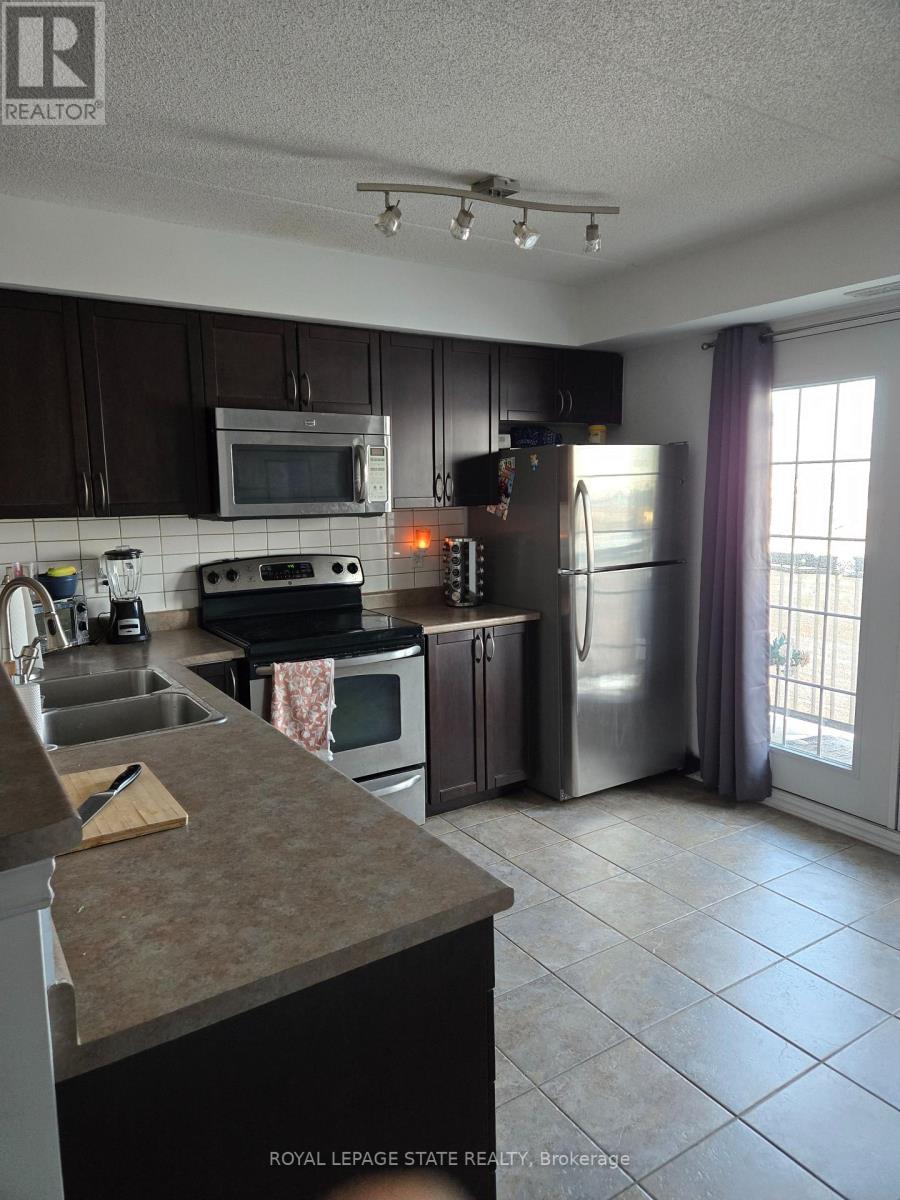 305 - 1390 Main Street E, Milton, Ontario  L9T 7S9 - Photo 4 - W12195107