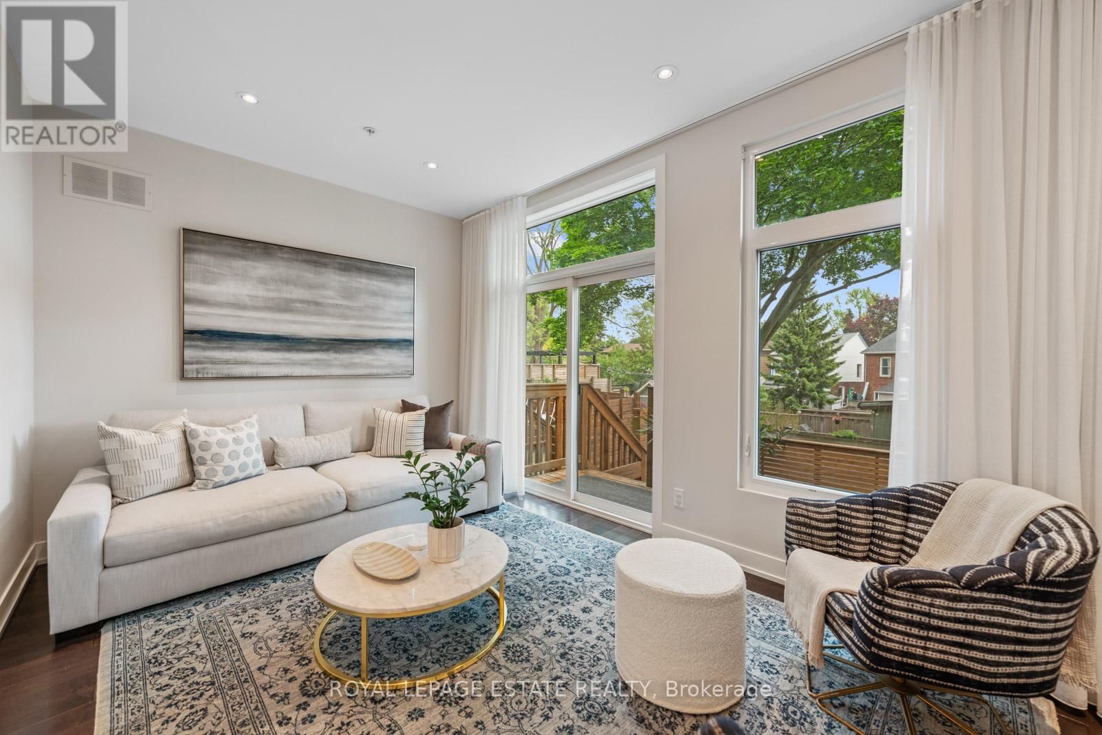 7 Vince Avenue, Toronto (Woodbine Corridor), Ontario  M4L 0A6 - Photo 4 - E12195015