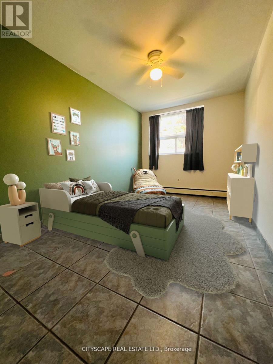104 - 242 Oakdale Avenue, St. Catharines, Ontario  L2P 3K5 - Photo 5 - X12159384