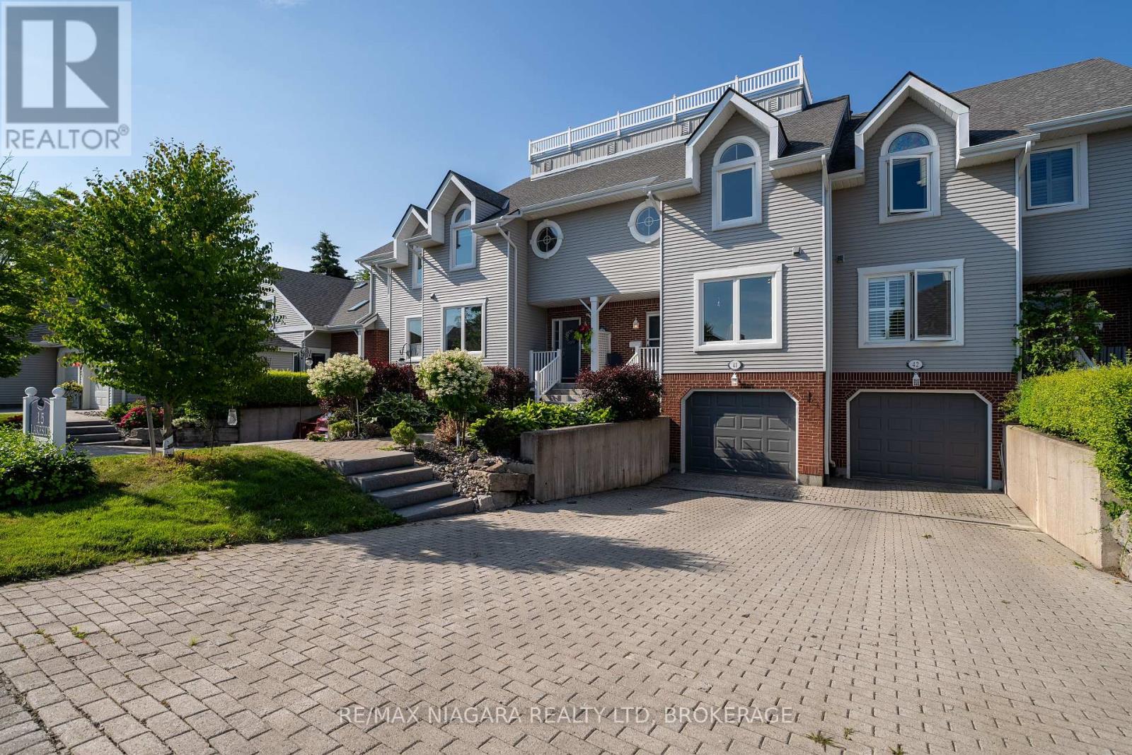 41 - 15 Lakeside Drive, St. Catharines (Port Weller), Ontario  L2M 1P3 - Photo 2 - X12195558