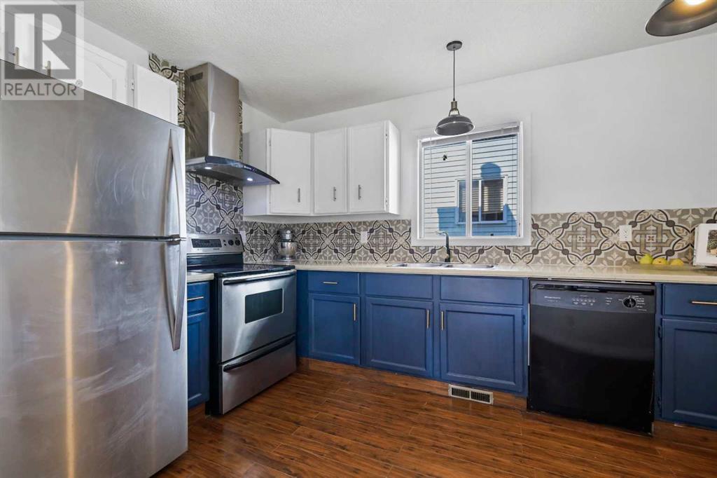 680 Macewan Drive Nw, Calgary, Alberta  T3K 3J5 - Photo 11 - A2227404