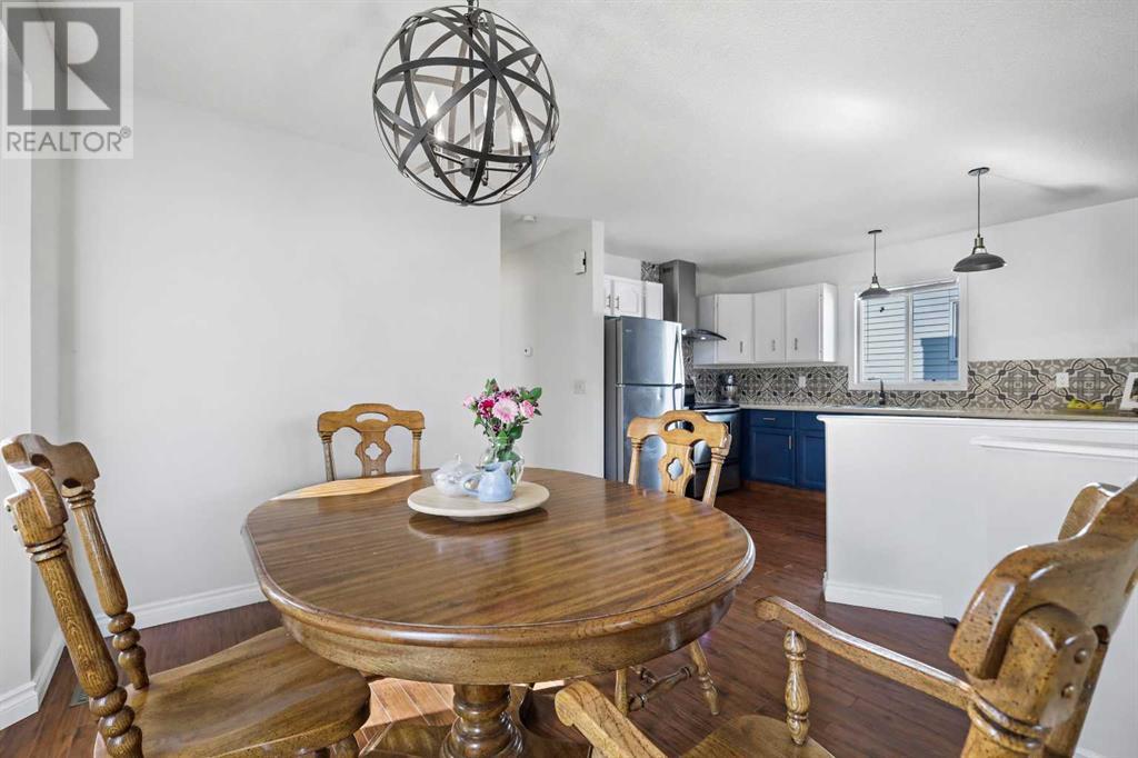 680 Macewan Drive Nw, Calgary, Alberta  T3K 3J5 - Photo 9 - A2227404