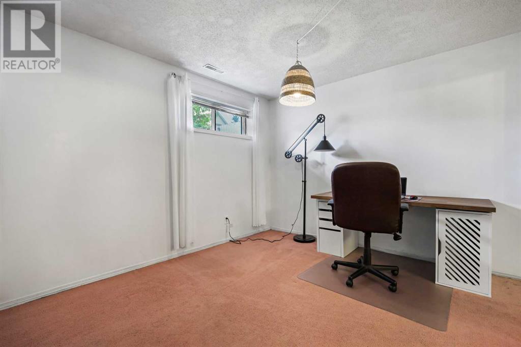 680 Macewan Drive Nw, Calgary, Alberta  T3K 3J5 - Photo 29 - A2227404