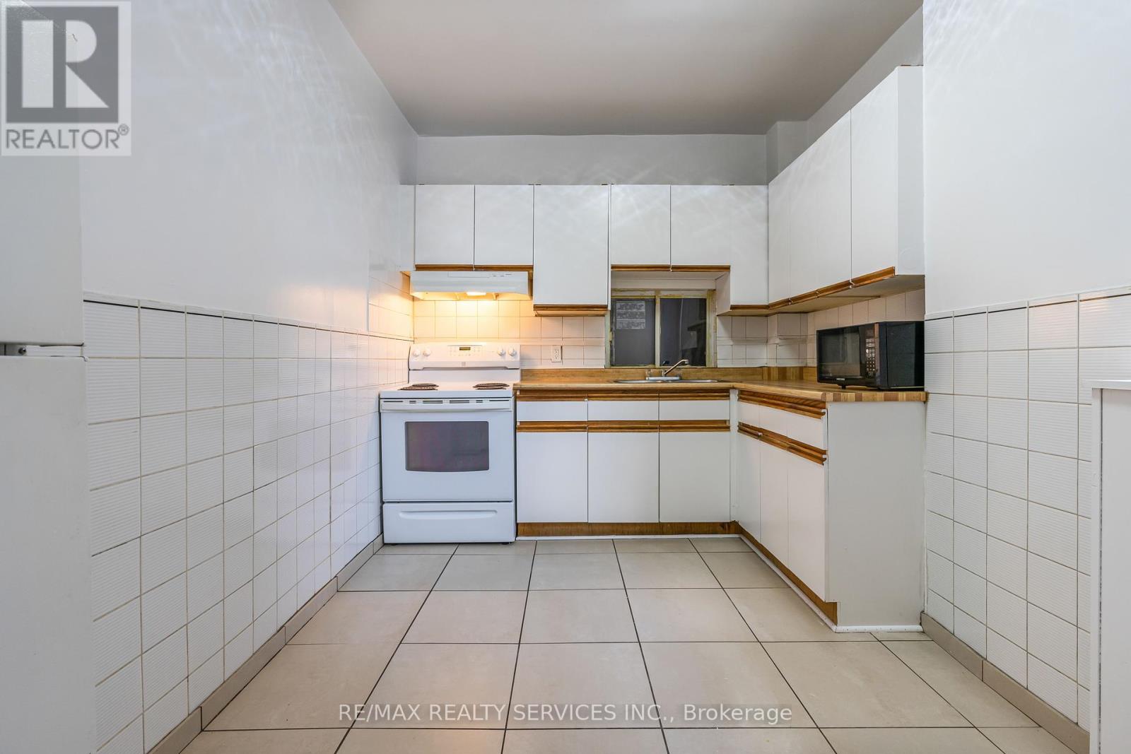 2 - 306 Greenwood Avenue, Toronto, Ontario  M4L 2R8 - Photo 9 - E12195572