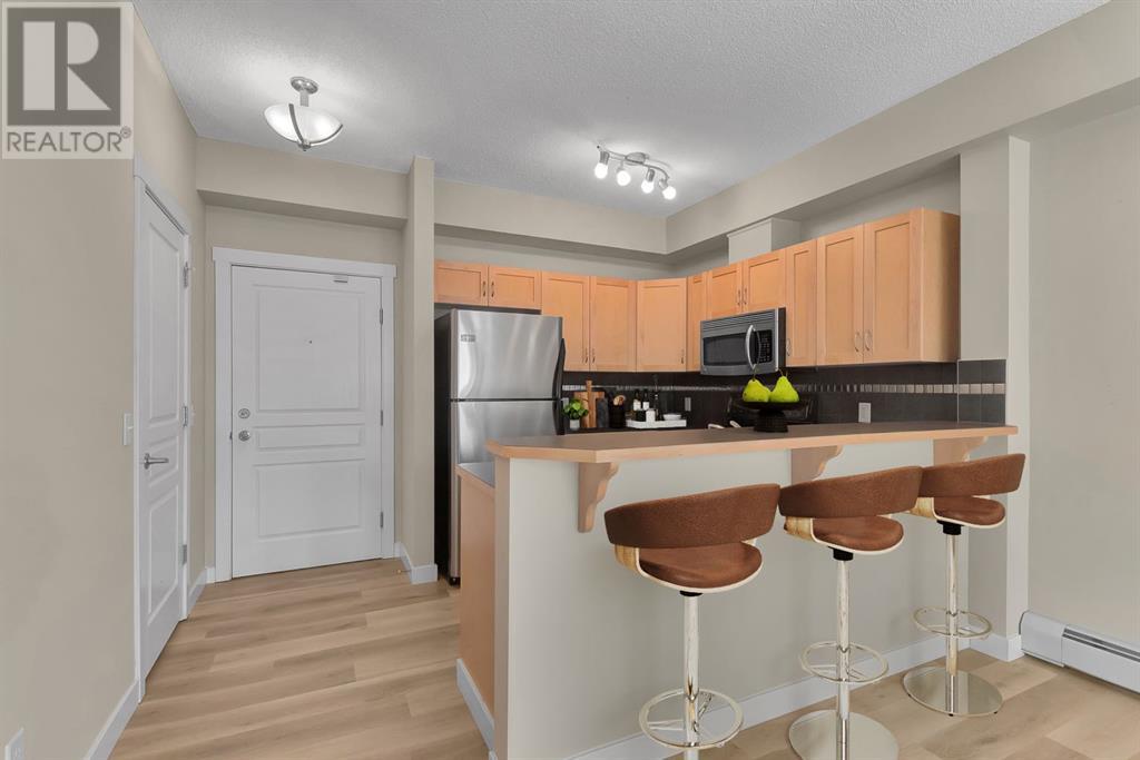 Property at 2107, 211 Aspen Stone Boulevard SW image 4