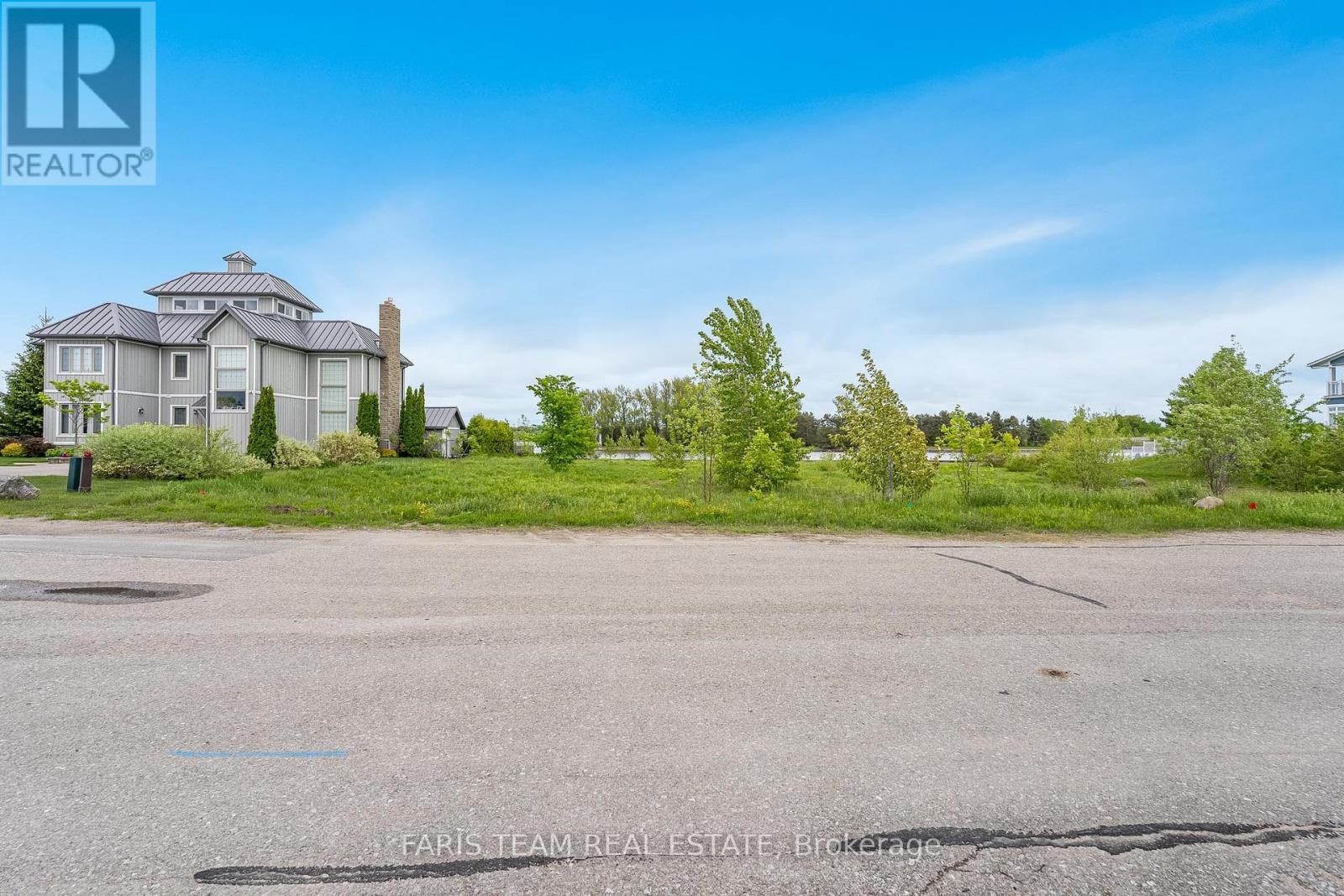 35 - 77 Dock Lane, Tay (Port Mcnicoll), Ontario  L0K 1R0 - Photo 2 - S12066795