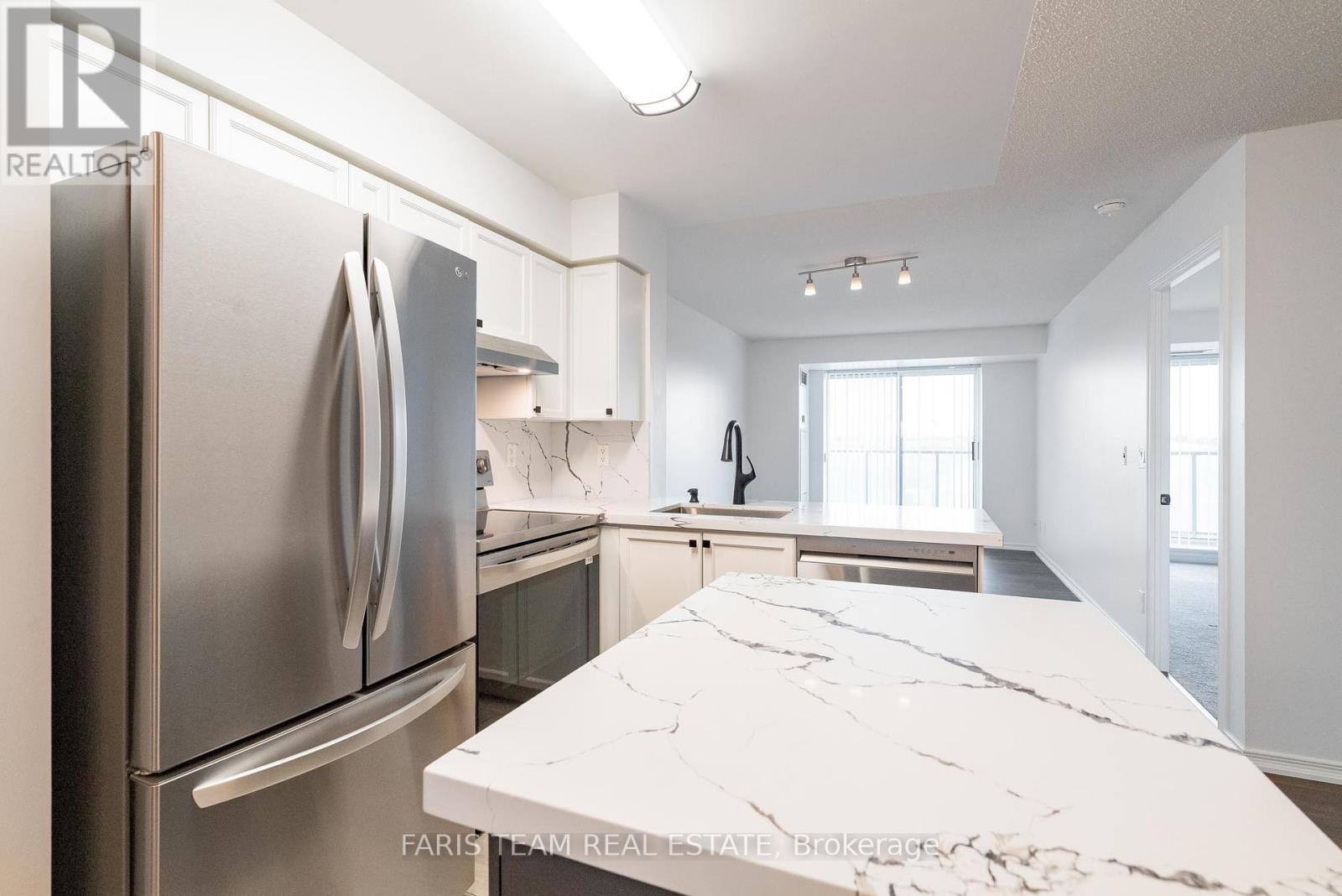 407 - 11 Oneida Crescent, Richmond Hill, Ontario  L4B 0A1 - Photo 6 - N12174240