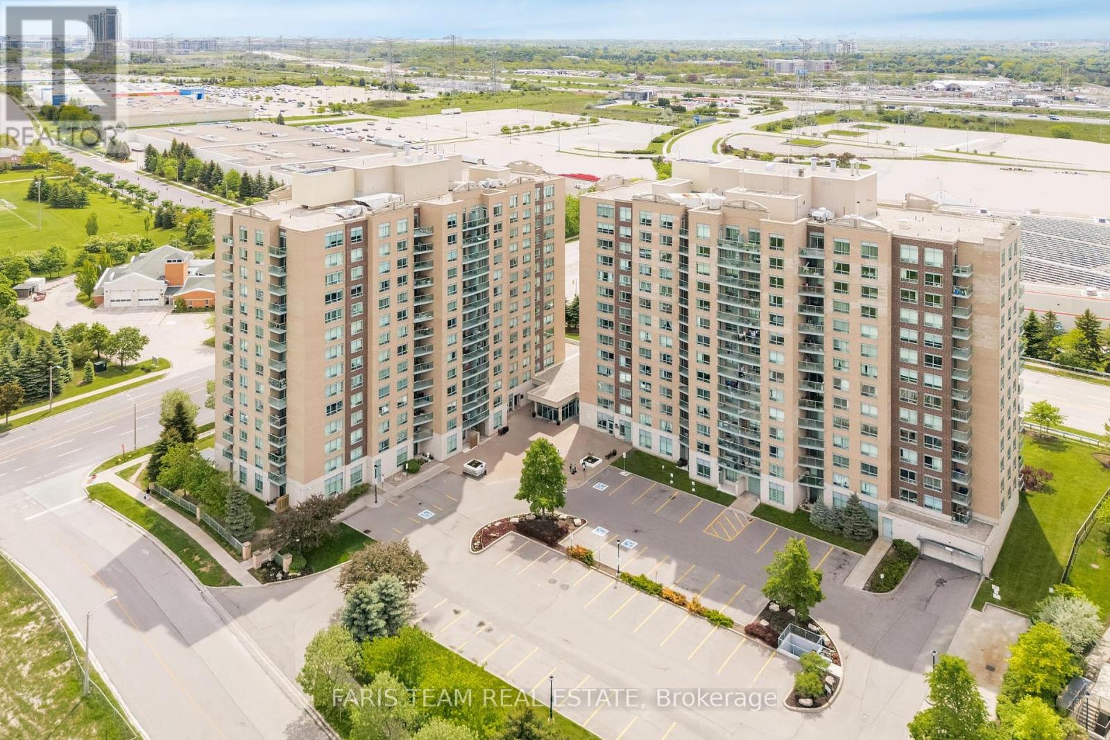 407 - 11 Oneida Crescent, Richmond Hill, Ontario  L4B 0A1 - Photo 2 - N12174240