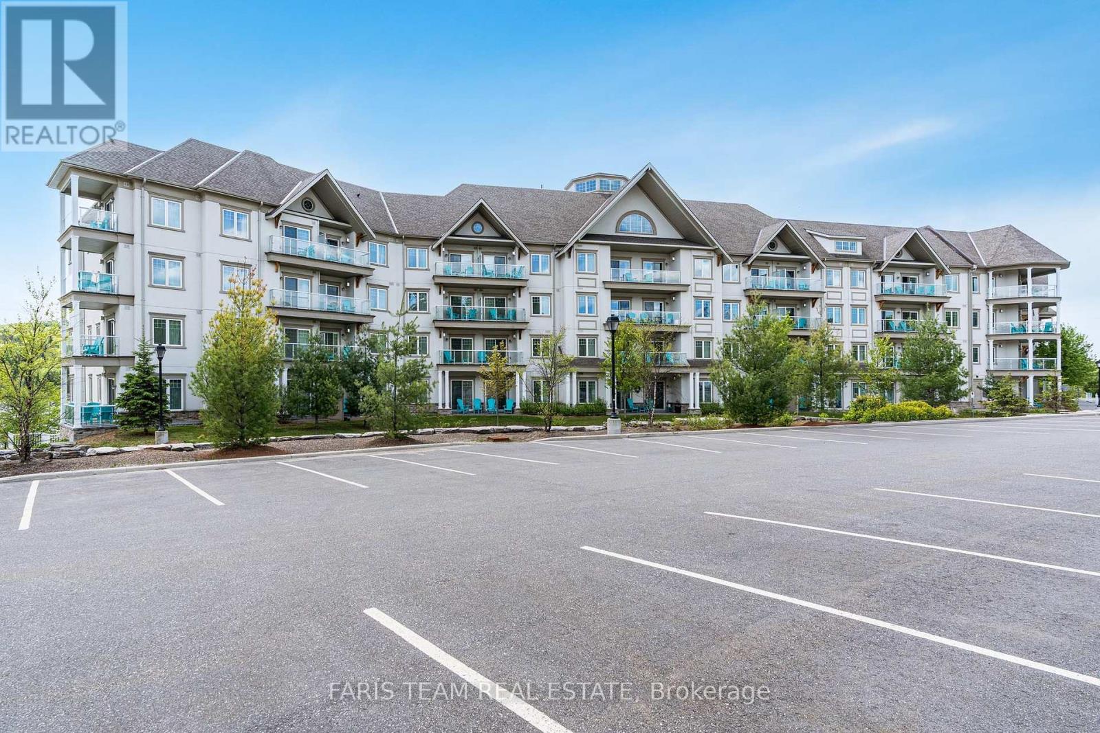218 - 25 Pen Lake Point Road, Huntsville, Ontario  P1H 1A9 - Photo 1 - X12104254